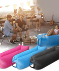 Inflatable Lounger Air Sofa Hammock For Outdoors Camping Beach And Festivals Portable Waterproof Couch Quick To Fill By Wind Or Fan Anti Leak Pouch Design Easy Inflate Black in rooftop setting.