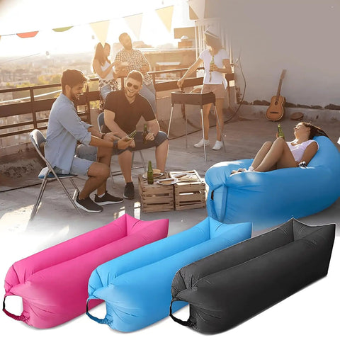 Inflatable Lounger Air Sofa Hammock For Outdoors Camping Beach And Festivals Portable Waterproof Couch Quick To Fill By Wind Or Fan Anti Leak Pouch Design Easy Inflate Black in rooftop setting.