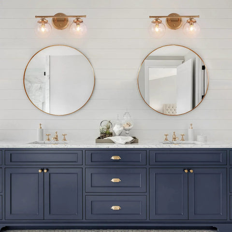 Two Light Gold Vanity Lighting Fixture With Globe Seeded Glass Shades For Bathroom over navy blue vanity cabinets