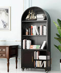 72 Inch Metal Arched Bookcase With Doors And Wheels Industrial Black Tall Storage Cabinet in living room setting