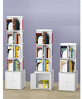 Solid Round Wall Coat Rack Featuring Four Or Eight Foldable Hooks For Entryway Organization Rustproof Metal Key Holder Multiuse Shelf in white with books.