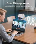 Man using Straight Up Dope 4K Dual Camera Webcam for Streaming and Video Calls on laptop during video call with dual microphones.