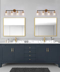 Modern Black And Gold Vanity Lights Over Mirror, Four Light Bathroom Fixture With Clear Glass Shades, 30 Inch Long Bath Vanity Bar For Powder Room