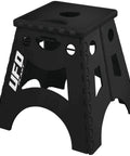 Foldable Plastic Bike Stand for Easy Storage and Go Anywhere Transport Stable Non Slip Base With Rubber Padding Quick Open and Close Design Lightweight Durable Black, black plastic stand with rubber top.