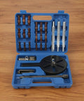 Thinking Process: bearing puller kit in blue case with metal rods, threaded screw, and puller plate