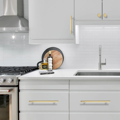 Modern kitchen with gray cabinets featuring 10 Pack 5 Inch Brushed Gold Knurled Cabinet Pulls for kitchen cabinets drawers and doors durable hardware.