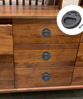 Flush Ring Pull Handles Set Of 3 In Black 43.5mm Zinc Alloy With Screws For Drawers on a wooden cabinet