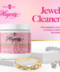 Top Tier Jewelry Cleaning Kit For Diamonds Gold And Platinum Sweeps Grime Away To Restore Lively Shine On Precious Stones Quick With Kosher Certified Gentle Formula Includes Handy Dipping Basket And Nylon Brush with Jewel Cleaner and jewelry pieces.