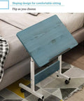 Mobile Workstation Lap Desk With Height Adjustable Wheels And Non Slip Bezel Edge Rolling Computer Table For Breakfast In Bed featuring a sloped blue wood surface.