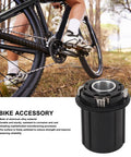 Beefy 11 Speed Bike Freehub Body For HG Flywheel With 15mm Thru Axle 2 Bearings 108 Rings 4 Claw Design with cyclist in background