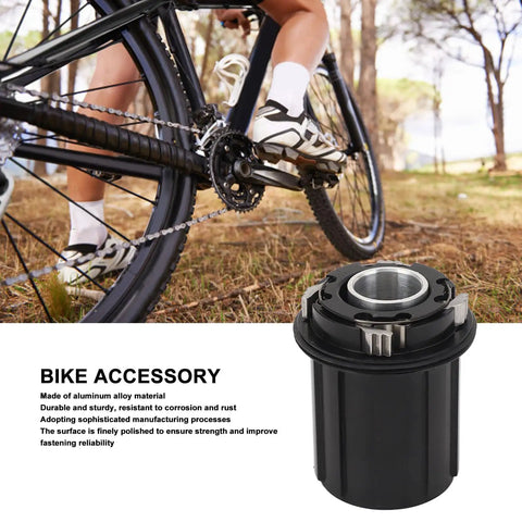 Beefy 11 Speed Bike Freehub Body For HG Flywheel With 15mm Thru Axle 2 Bearings 108 Rings 4 Claw Design with cyclist in background