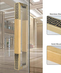 Beefy Modern Entry Door Handle Pull Set Heavy Duty Door Handles With Natural And Gold Finish 59 Inch Long Stainless Steel And Wood Pulls Easy DIY Assembly With All Hardware Included Durable Front Door Accessory installed on glass door.