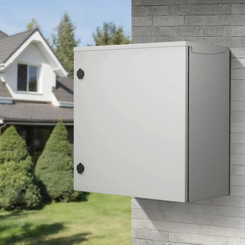 Badass Carbon Steel NEMA 4 Electrical Enclosure 24X24X12 IP65 mounted on wall in outdoor setting, dustproof and waterproof.