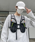 Person wearing Hydration Vest For Outdoor Adventures With Easy Access Water Bladder System Reflective Front Chest Pocket And Multiple Storage Pockets Lightweight Gear Built For Trekking Camping Cycling And Mountaineering
