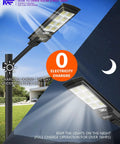 Ultra Bright 350000LM Solar Street Lights With 384 LEDs 1500W Dusk To Dawn Motion Sensor Flood Lights shown charging and lit at night