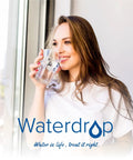 Woman drinking water at window, Waterdrop logo visible, concept of hydration and water purification.