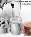 Top Shelf Compact Espresso Maker With 20 Bar Pressurized Pump And One Touch Milk Frother System in use with frothing pitcher.