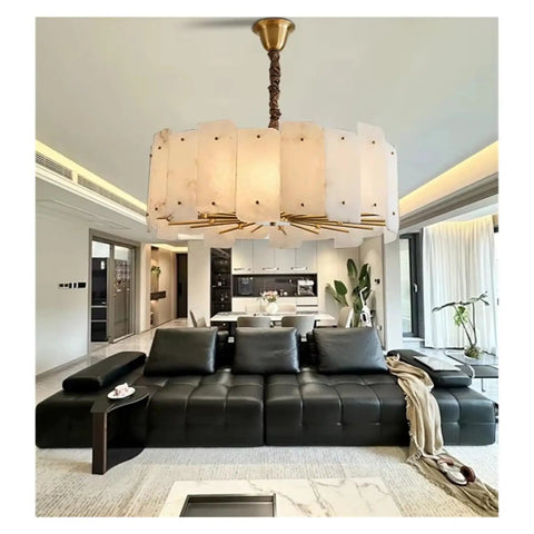 Slick Modern Marble Ceiling Pendant Light With Easy Dimmable Brightness And Genuine Stone Build That Totally Boosts Your Dining Room Or Kitchen Island Home Lighting Setup above modern black sofa in a stylish living room.