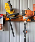 8-Inch Vertical Trimmer Rack Wall Mount Heavy Duty Garden Tool Hanger holds trimmer, blower, and chainsaw in garage, orange