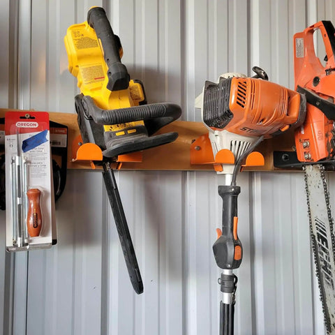 8-Inch Vertical Trimmer Rack Wall Mount Heavy Duty Garden Tool Hanger holds trimmer, blower, and chainsaw in garage, orange