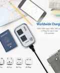 Image of Travel Voltage Converter 220V To 110V With 4 USB Ports And Worldwide Plug Kit with passport and map for travel.