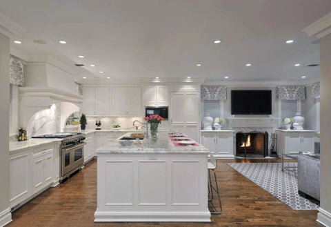 Modern kitchen with overhead lighting, featuring 12 Pack 4 Inch Classic White Recessed Light Trim With Metal Step Baffle Ring.