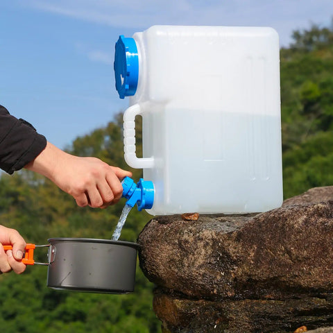 4 Gallon Camping Water Jug With Spigot For Emergency Water Storage Outdoors in use, dispensing water into pot