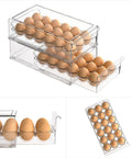 Clear BPA Free Refrigerator Organizer Bins With 18 Egg Tray Stackable Holder For Fridge Storage See Through Egg Bin Space Saver Durable Egg Storage Organizer For Freshness And Easy Access showing stacked bins and eggs.