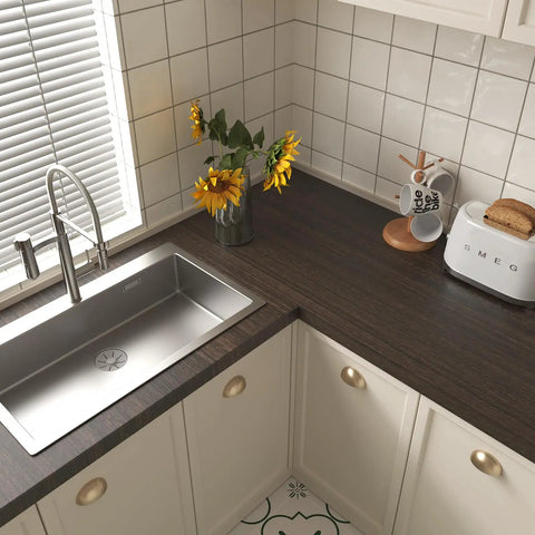 Kitchen view with Wide 32 Inch By 354 Inch Textured Dark Wood Vinyl Film Peel And Stick for countertops next to sink
