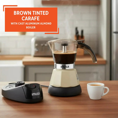 Dang Compact Two Cup Electric Espresso Maker With Cool Touch Handle Brews Rich Smooth Coffee straight up on a kitchen counter.