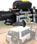 Heavy Duty Electric Winch Kit For Jeeps And Trucks With 4000 Lbs Load Capacity, 24V Power, Waterproof IP67 Rating, Wireless Remote, Steel Cable Towing Gear For Off-Road Adventures And Boat Recovery, close-up view with control and hook.