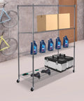 Heavy Duty 4 Tier Wire Shelving Rack Smooth Operator Design Adjusts in Seconds with tools, boxes and oil bottles in garage setting.