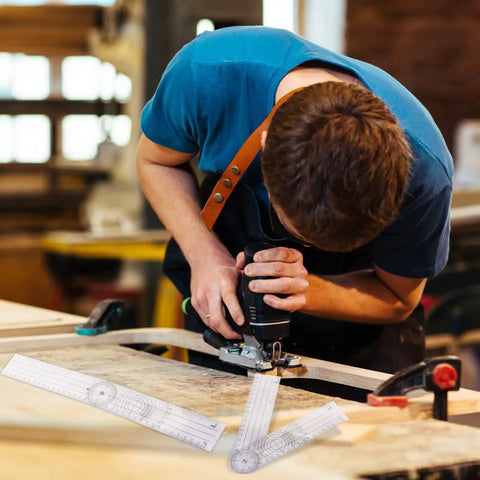 Man using power tool on wood with Straight Up Best Two Piece Clear Plastic Goniometer Set for measuring angles.