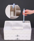 Disposable Crevice Cleaning Tool Set With 50 Replaceable Brush Heads, shown cleaning a small divided drawer organizer.
