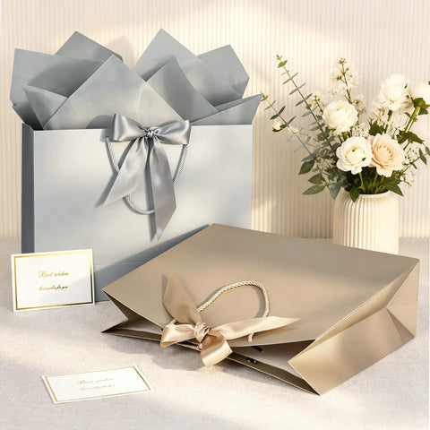 Champagne gold gift bag with handles, 13 inch, includes tissue paper and card, perfect for various occasions.