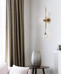 Three Light Modern Wall Sconce With Clear Glass Globe And Gold Base For Bedside Or Living Room Sleek Gold Wall Lamp