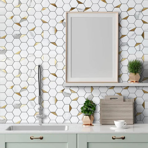 Hexagon Peel And Stick Tile Backsplash Kit With White Marble Look And Gold Metal Accents installed in kitchen setting