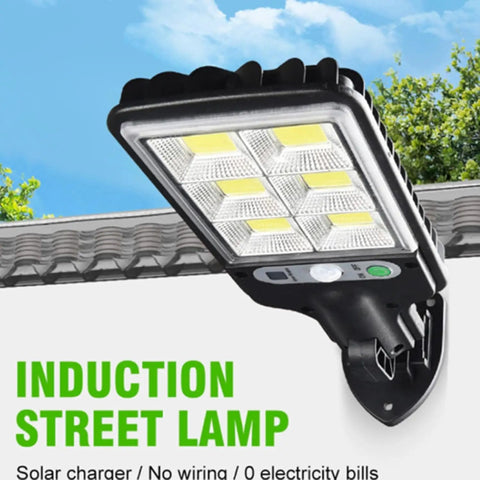 JUDYSSY 128Cob Solar Lights Outdoor Waterproof, Solar Flood Lights Outdoor Motion with Remote on a mounting bracket, showcasing LED bulbs.