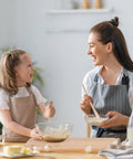 Totally Awesome Wooden Kitchen Play Set For Toddlers Includes Seven Piece Children Cooking Utensils Collection With Cutting Board Rolling Pin And Super Safe Knives For Little Chefs Baking Adventures, mother and daughter baking together.
