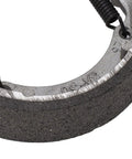 Close-up of electric scooter front drum brake pad shoe replacement part built tough from lightweight metal for smooth stops.