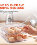 Clear Acrylic Stackable Egg Container For Refrigerator, 36 Count, hand accessing eggs in double-layer acrylic organizer.