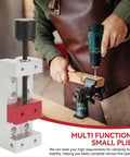 Compact Mini Drill Press Bench Vise Clamp 2 Inch Opening, 50mm Capacity, held by person during woodworking project
