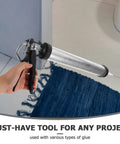 Top Tier Metal Caulk Gun With Thick Half Round Rod For Windows Doors And Bathroom Sealant Worry Free Application Adhesive Applicator held in hand.