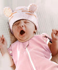 Baby yawning in pink Arms Up Newborn Swaddle Sleep Bag 0-3 Months, Breathable Pink Bunny Baby Swaddles With Cuff Removable Design