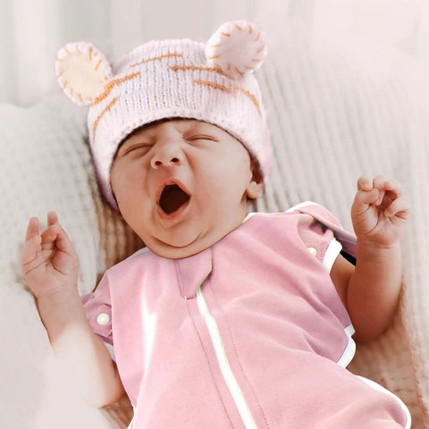 Baby yawning in pink Arms Up Newborn Swaddle Sleep Bag 0-3 Months, Breathable Pink Bunny Baby Swaddles With Cuff Removable Design