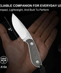 Buddy Fixed Blade Knife With 3 Inch D2 Steel Blade, Olive Green Micarta Handle, shown on hand for scale, 1081M1