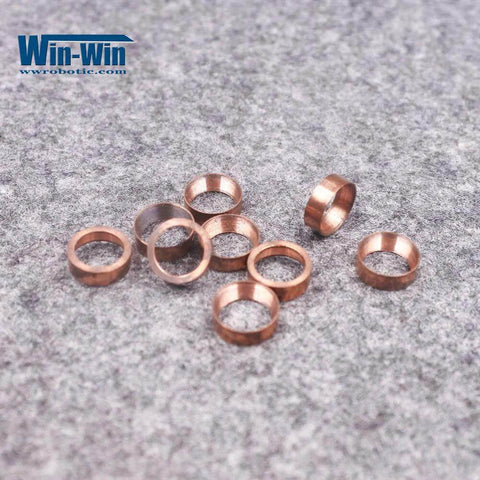 Copper valve seal rings for waterjet bleed-down valve; set of small copper hoop seals, close-up view