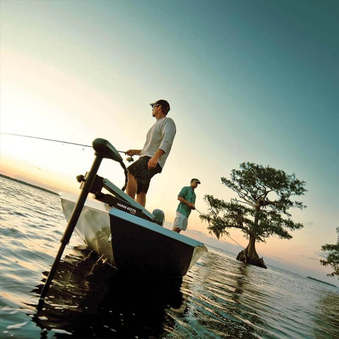 Two men on a boat equipped with Edge Bow Mount Electric Trolling Motor With Foot Pedal Control For Freshwater Boats 70 lb thrust