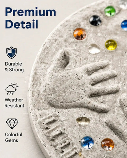 Close-up of DIY Handprint Stepping Stone Kit For Garden Easy No Mess Large 14 Inch Cement Footprint Stone with colorful gems.