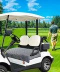 White golf cart on a course featuring Plush Golf Cart Seat Covers With Thickened Plush Seat Towel Blanket And Non Slip Backing